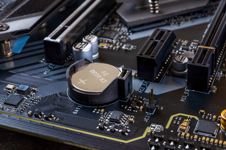 how long do motherboard batteries last CMOS battery on computer motherboard showing coin cell battery placement and hardware components