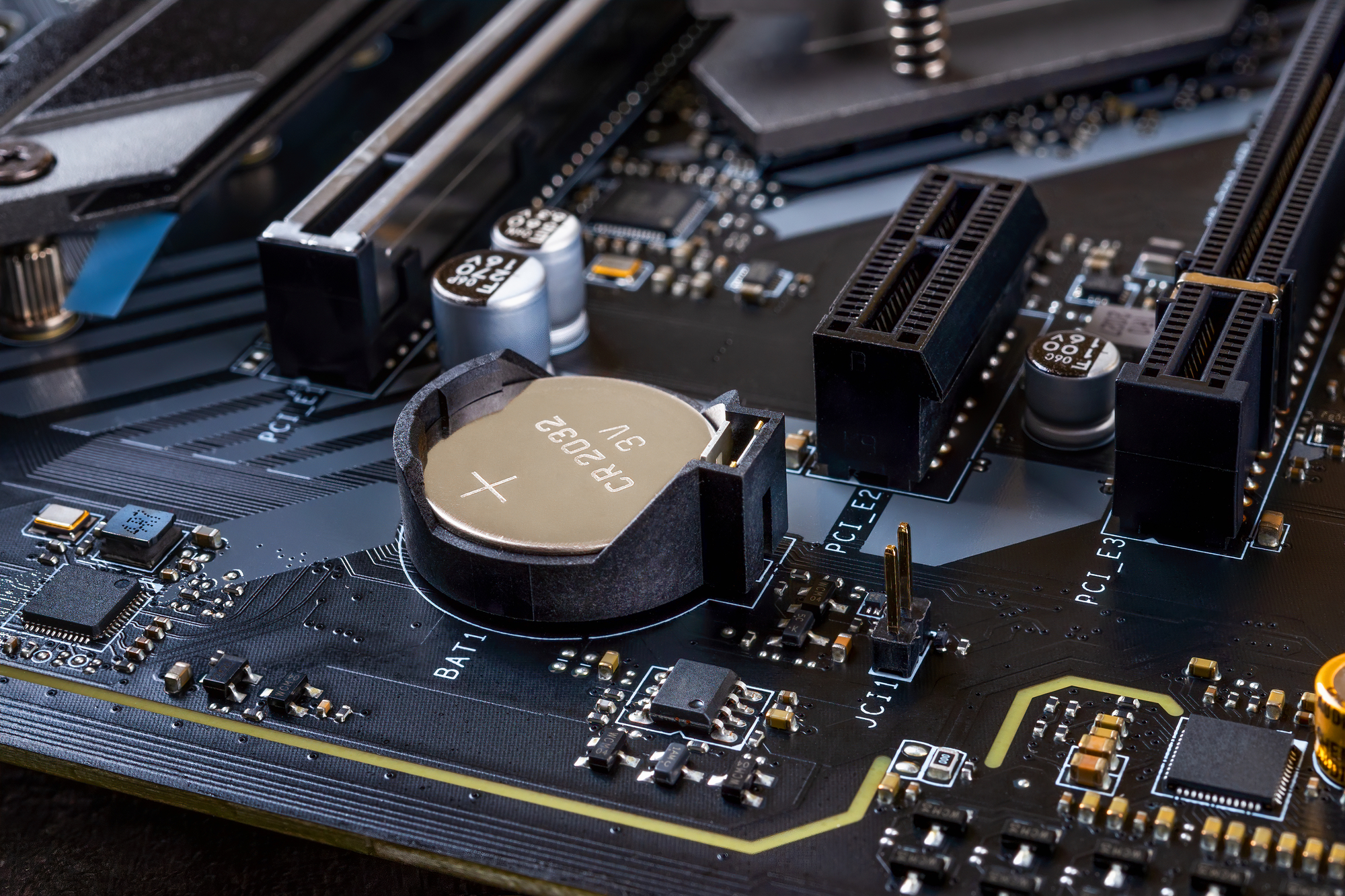 how long do motherboard batteries last CMOS battery on computer motherboard showing coin cell battery placement and hardware components