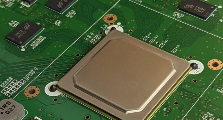 Nintendo Wii motherboard circuit board showing CPU, GPU, memory chips, and wireless modules used in Wii gaming console for efficient performance.