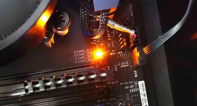 What does it mean when the motherboard pulses orange light showing hardware or RAM issue on computer system