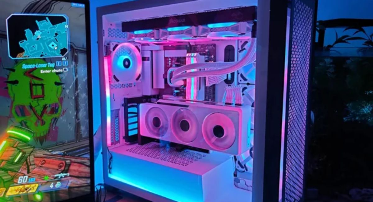 Black PC case with white motherboard featuring RGB fans, tempered glass panel, clean cable management, and modern gaming setup design.
